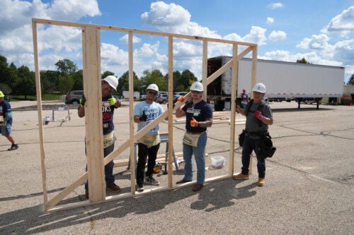 A parking lot full of possibility: American Family Insurance builds with Habitat Dane