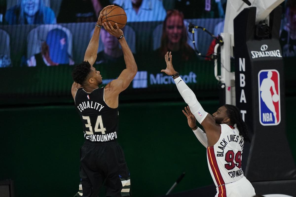 Slipping away: Bucks' last-minute comeback bid falls short as Heat