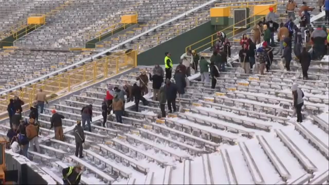 The MetLife Stadium field crew had a busy day shoveling snow at the Packers-Giants  game