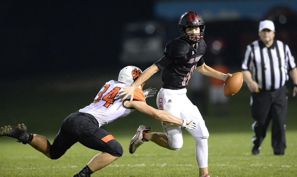 Prep football photo: Sun Prairie quarterback Brady Stevens on the run