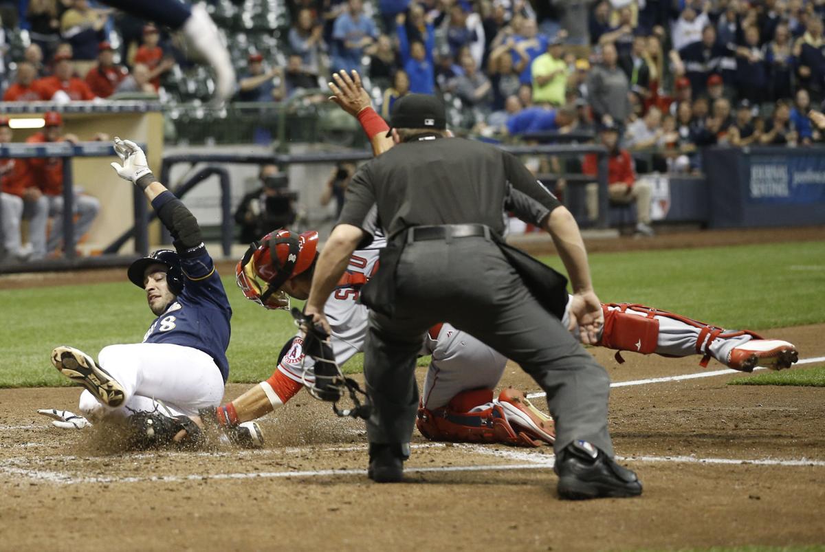 Brewers Jimmy Nelson's pitching and hitting lead Milwaukee over Angels