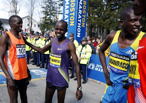 Cheruiyot stands tall to defend Boston Marathon title