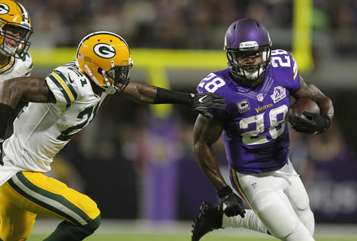 Adrian Peterson forced from Vikings lineup with knee, groin injuries