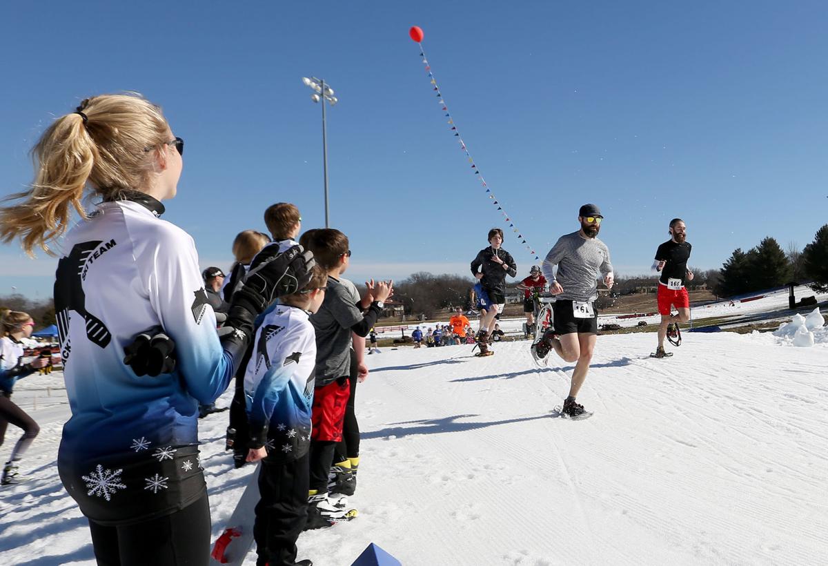 Photos Snowshoes and shorts at the Madison Winter Festival Local