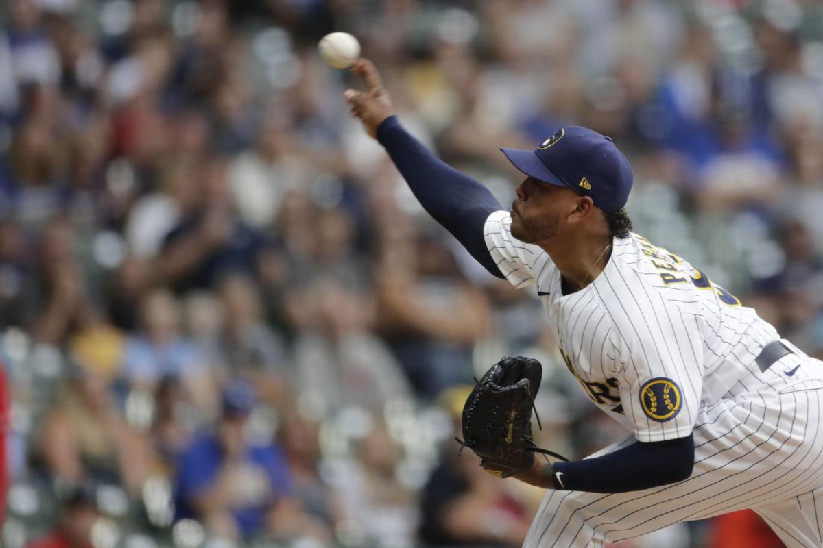 2 more Brewers positive for virus; Strickland, Cousins out