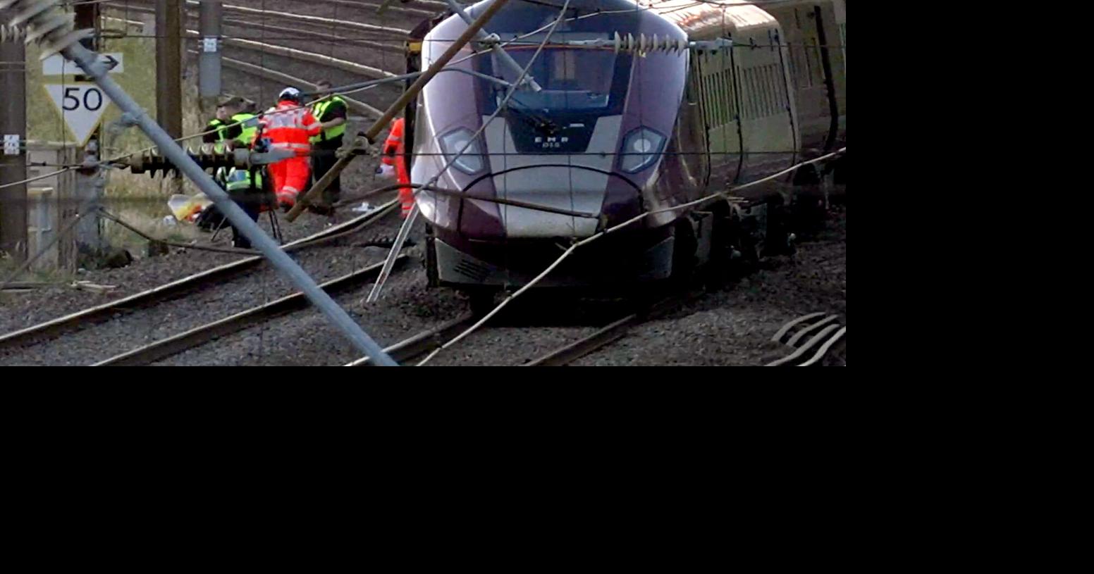 UK police probe cause of train collision that killed driver and left 9 in critical condition