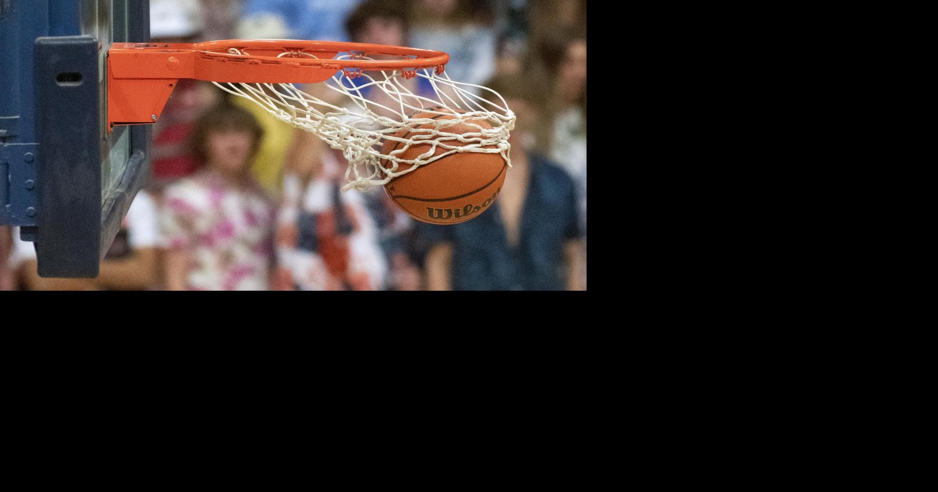 PHOTOS: Crosstown rivals battle it out on the hardwood