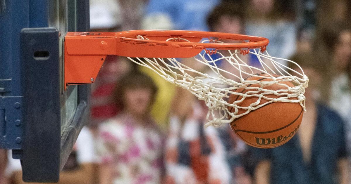 PHOTOS: Crosstown rivals battle it out on the hardwood