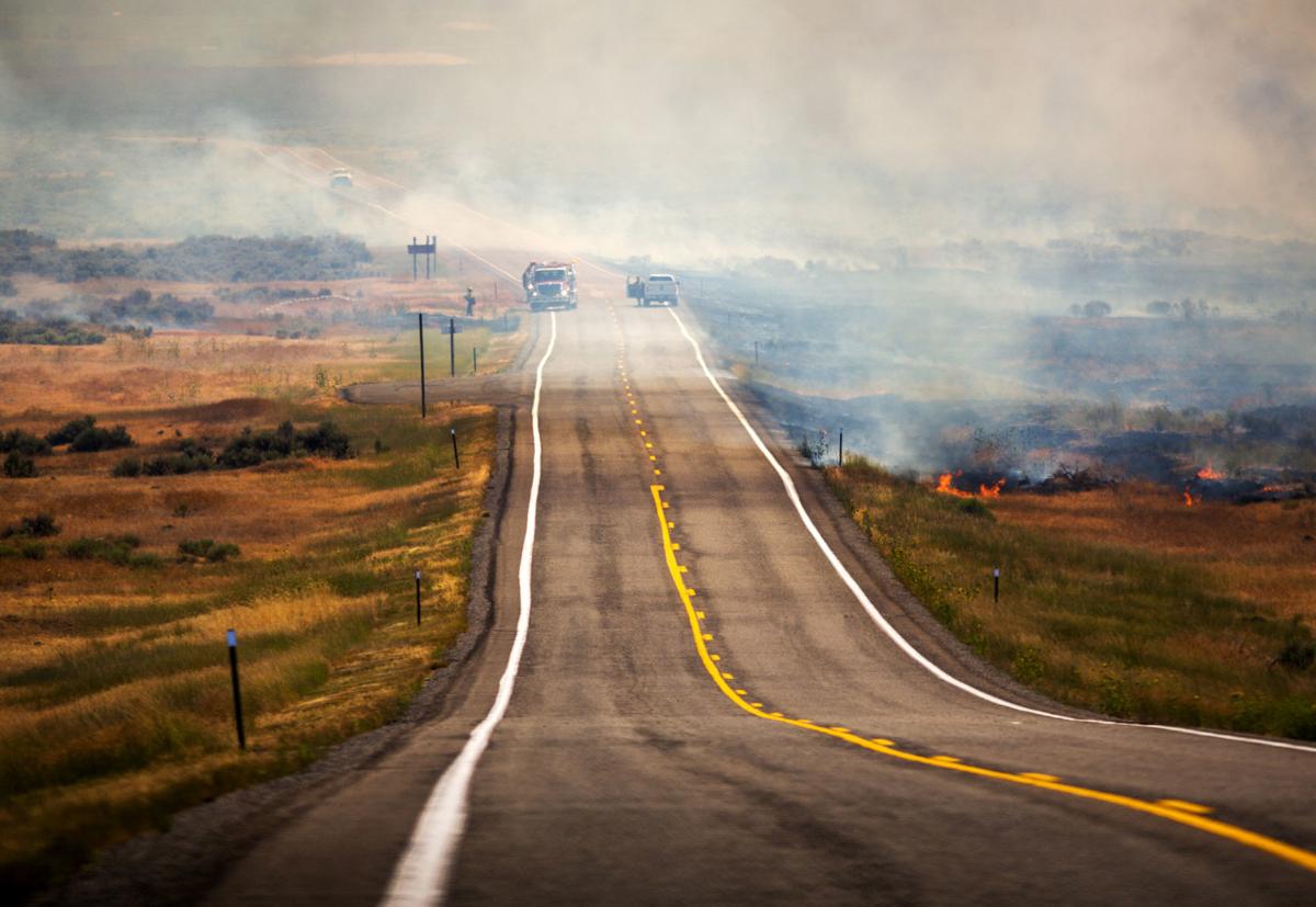 UPDATE Fire jumps Idaho 46 north of Gooding, threatens structures
