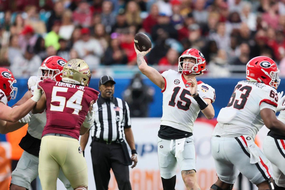 Georgia quarterback Carson Beck attempts a pass during the second quarter against Florida State in the Orange Bowl at Hard Rock Stadium on Saturday, Dec. 30, 2023, in Miami Gardens, Florida.