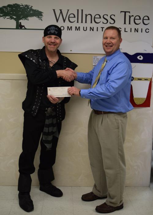 Wellness Tree accepts donation from bank