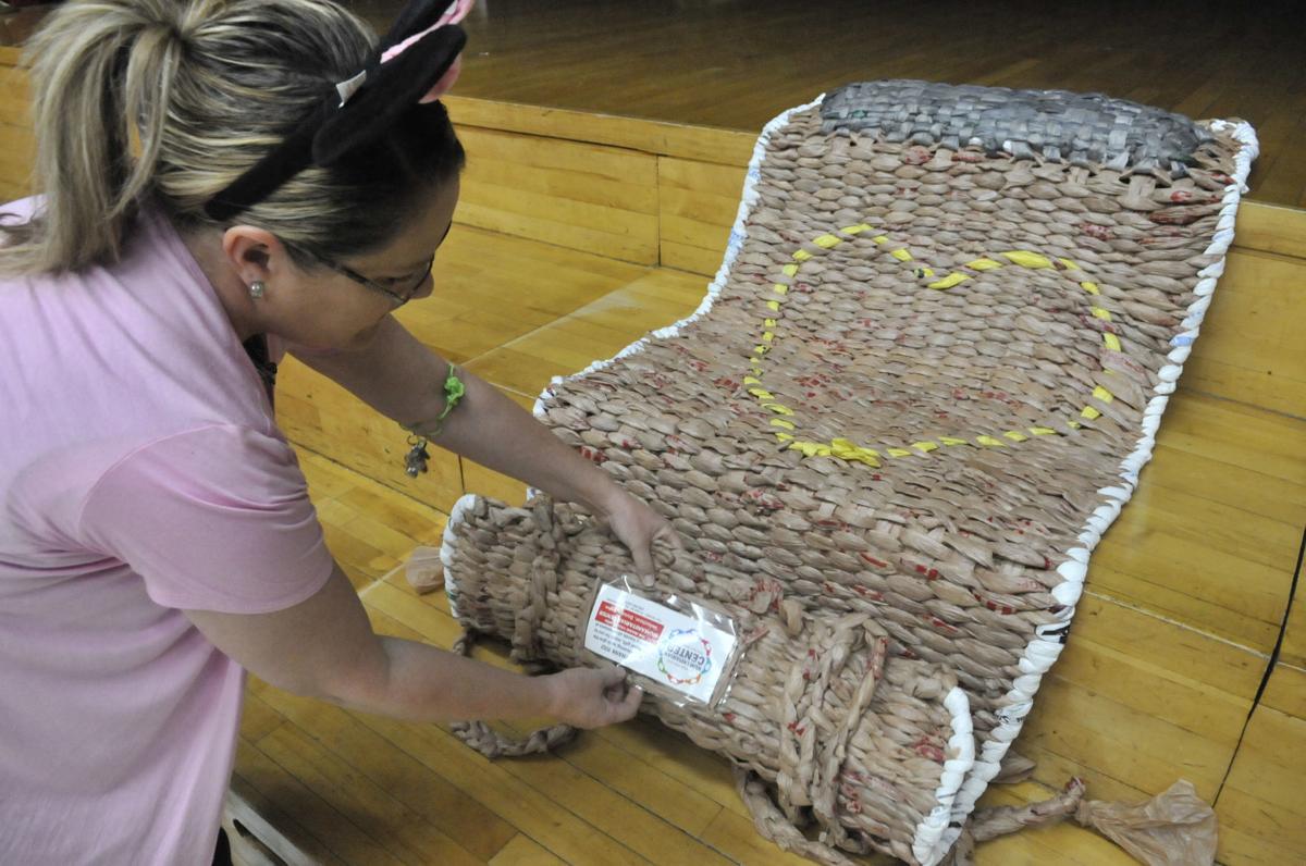 Hours of crocheting plastic bags to become a sleeping mats for the homeless