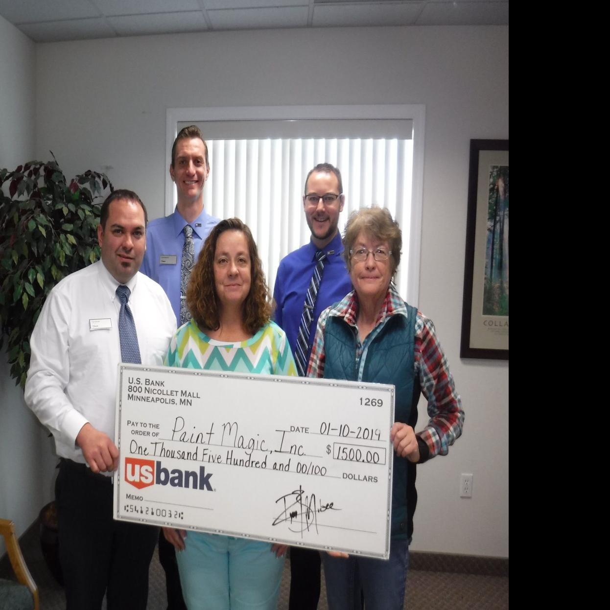 Paint Magic Receives Check From U S Bank Southern Idaho