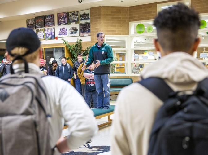 Speaking to his students