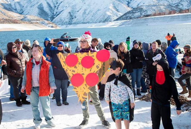 Hundreds plunge into Lucky Peak Reservoir for Great Polar Bear Challenge