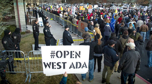 Idaho health board meeting halted after 'intense protests'