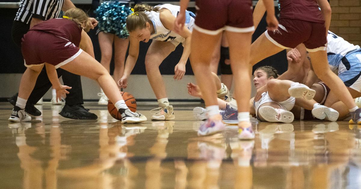 Across town rivals battle it out on the hardwood