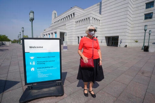 Mormon vaccine push ratchets up, dividing faith's members
