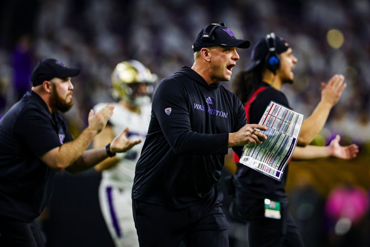 Washington Huskies head coach Kalen DeBoer and the coaching staff are looking more animated in the second half against the Michigan Wolverines in the CFP National Championship Monday, Jan. 8, 2024, at NRG Stadium in Houston.