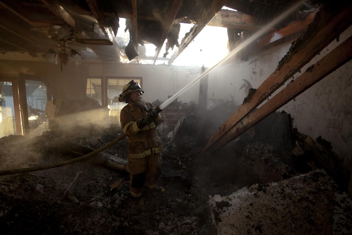 Fire destroys home in Gooding, injures firefighter