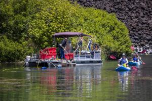 Volunteers take action to restore Blue Hearts Spring to its natural, blue beauty