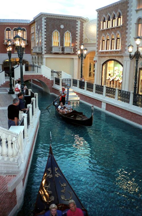 The Venetian Hotel, here in a 1999 file image, is set on a Grand Canal. The hotel is offering a a four-night $450,000 package that pulls out all the stops.