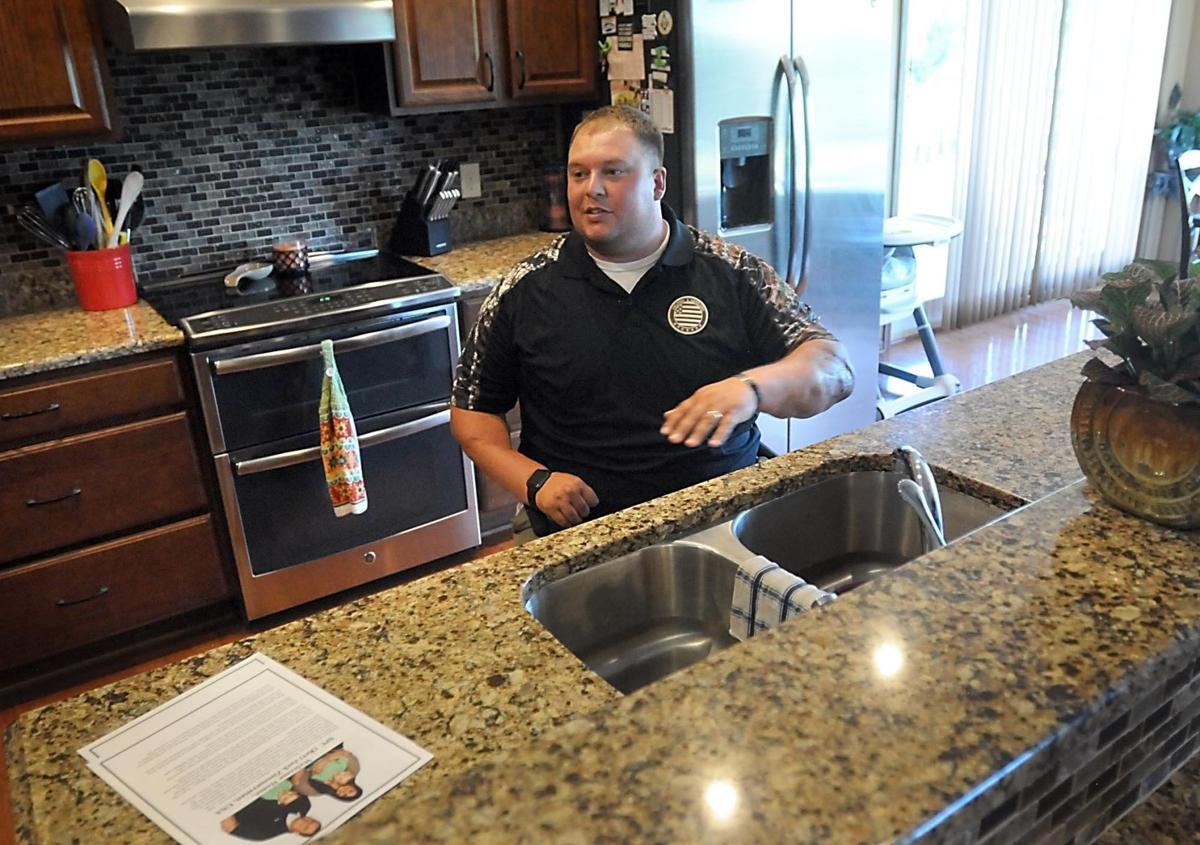 Wounded vet Jack Zimmerman formally receives lakeside home Local News