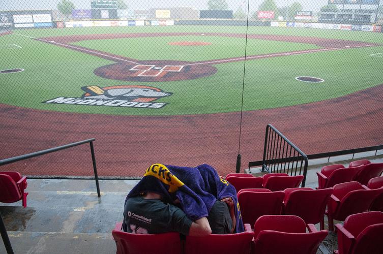 Baseball opener delayed by rain