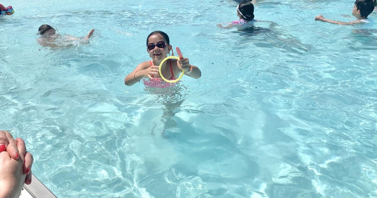 Swimmers come in waves for Tourtellotte Pool opening day
