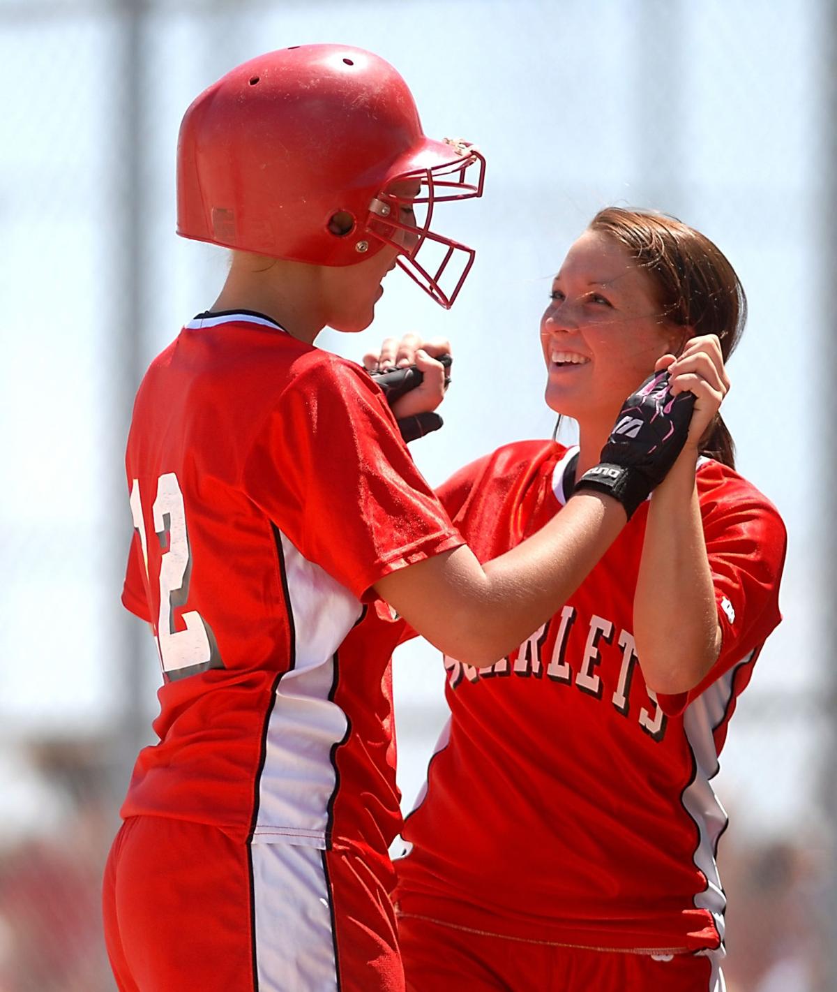 Scarlets softball squad wins in extras Sports