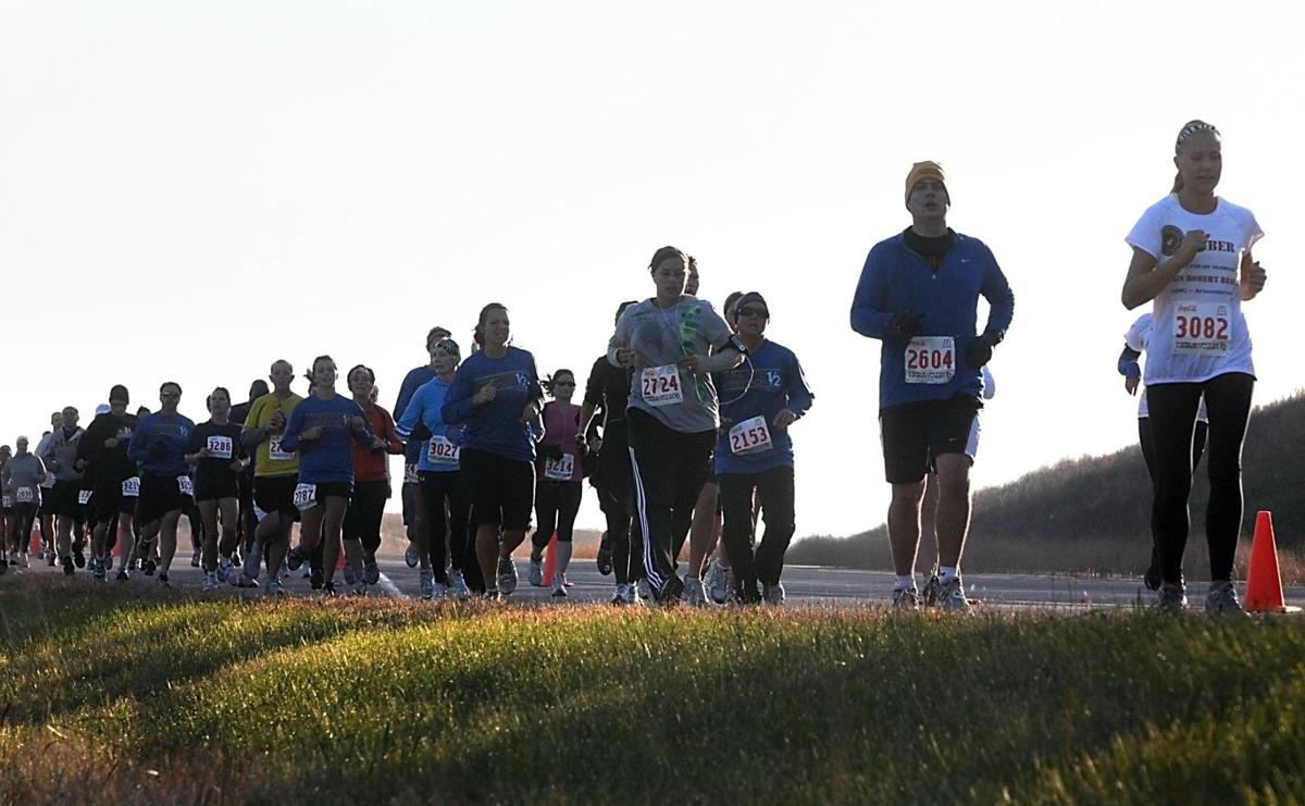 Half marathon winners keep a brisk pace Sports