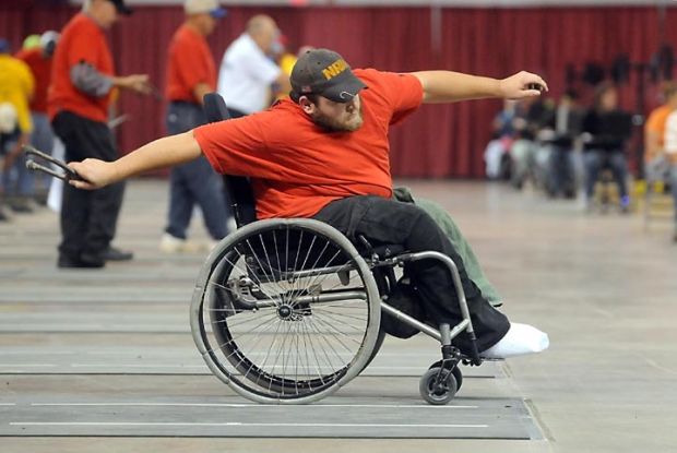 Pitching horseshoes from a wheelchair Local News mankatofreepress pic