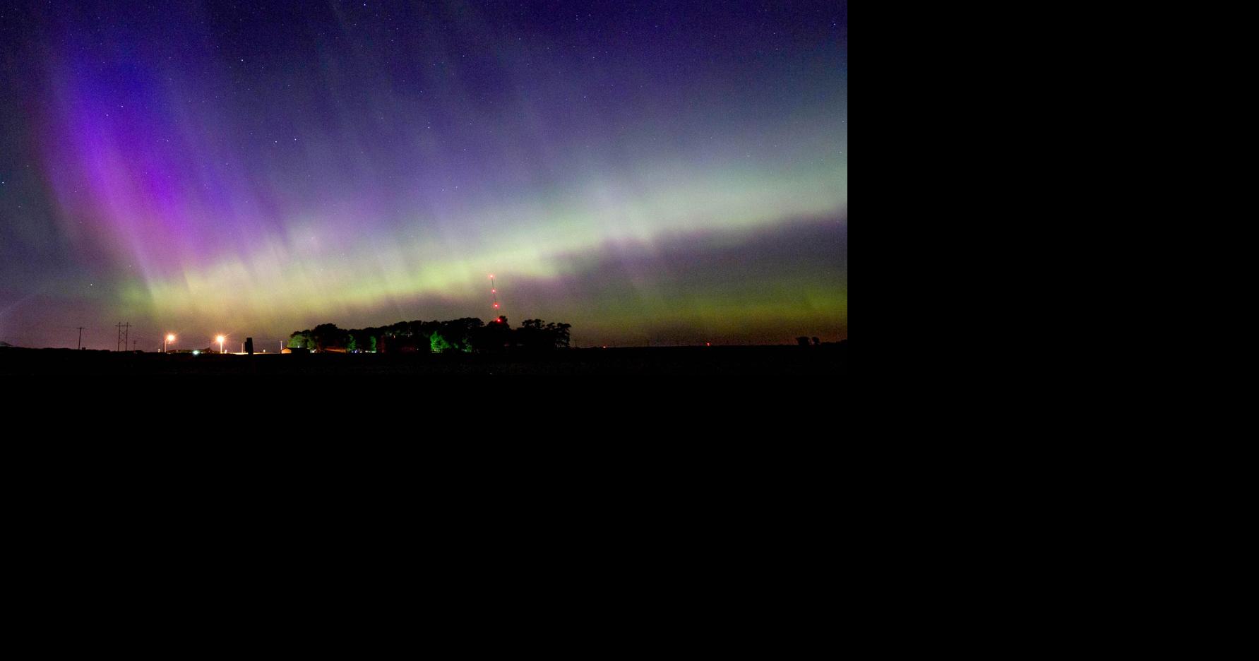 Moonrise Over Northern Lights -- a brilliant aurora shines above a nearly  full moon during a chilly winter night on Alaska's north slope, Smithsonian Photo Contest