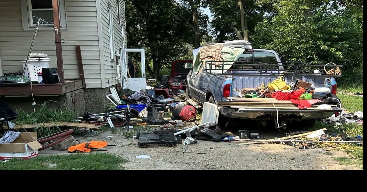 City takes emergency action against garbage house