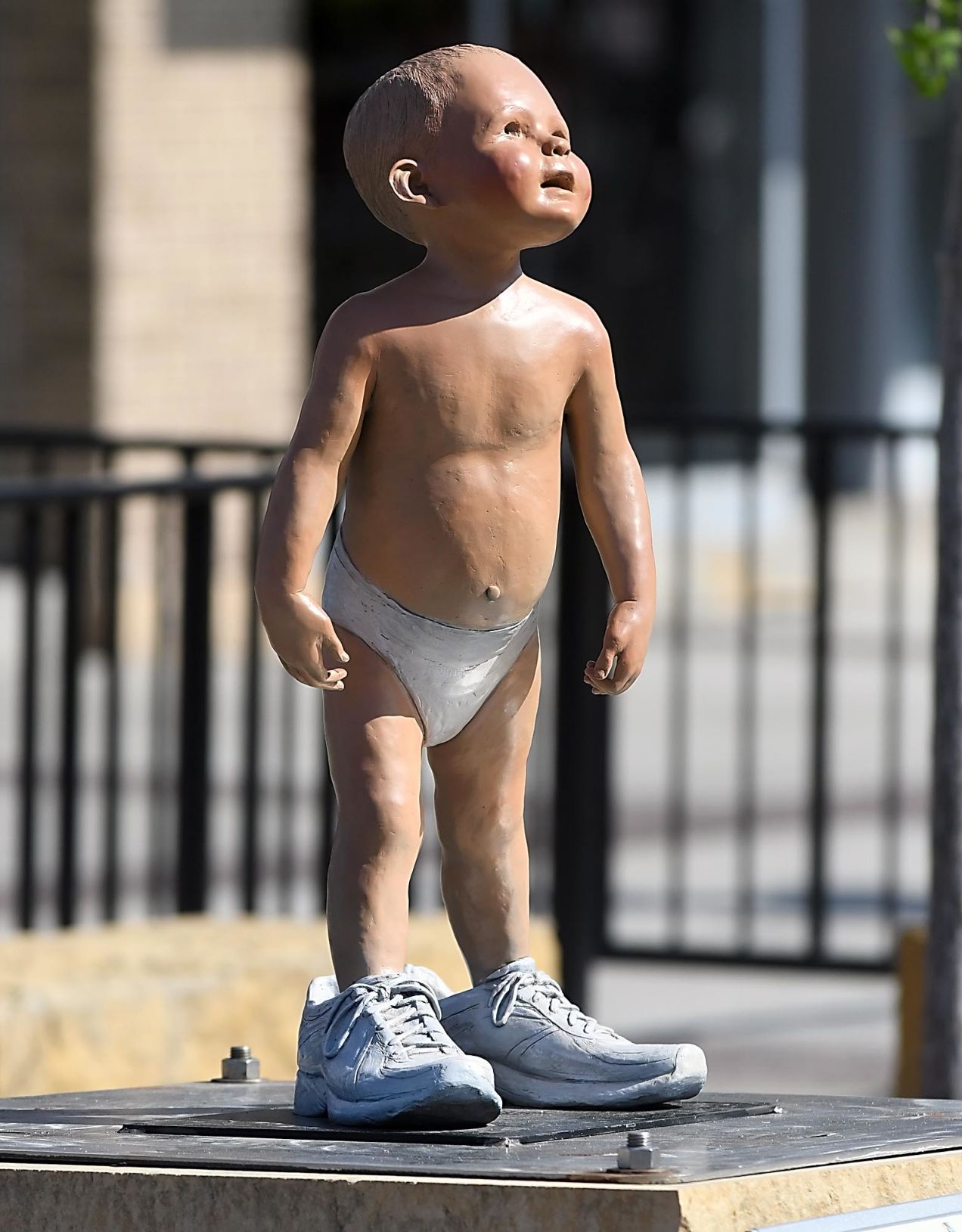 Oh, baby! Sculpture near Blue Bricks is getting some attention