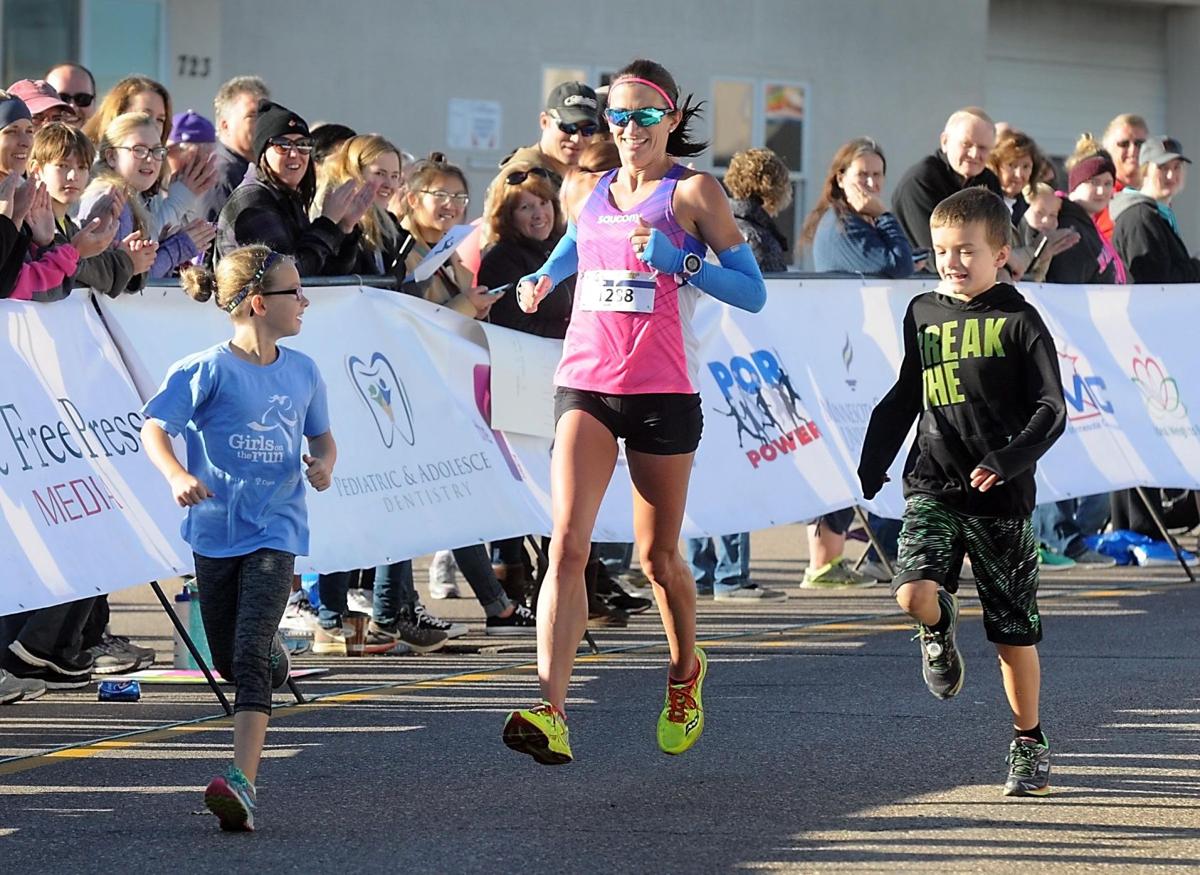 Lastminute entrant wins women's halfmarathon Sports