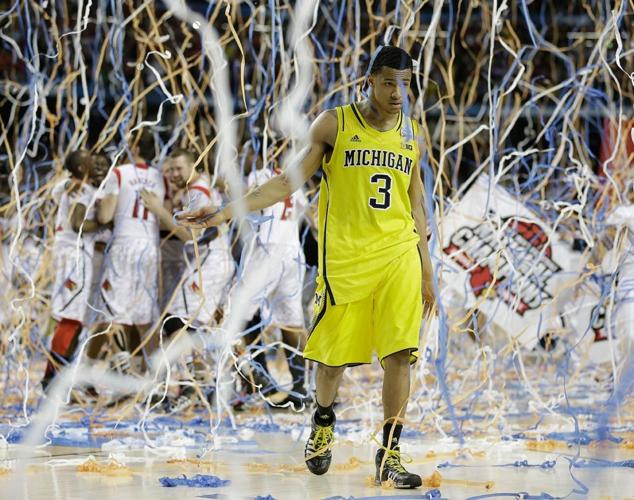 NCAA: Louisville rallies past Michigan to win men”s basketball national  championship – Monterey Herald