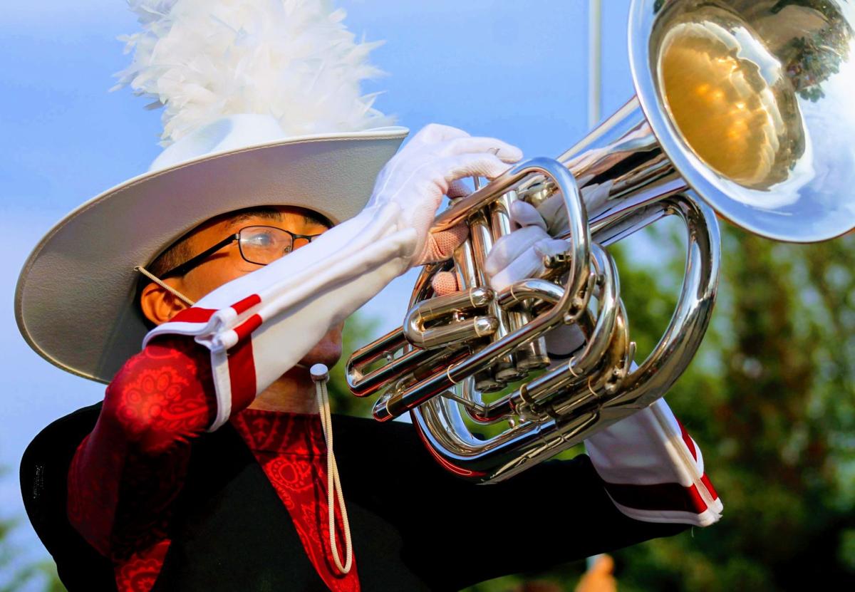 The marching band refused to yield Lancers' season canceled, but the