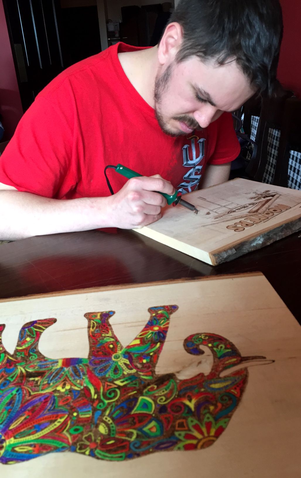 BURNIN' UP! Wood burning artist documents tornadoes, wildlife and