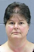 Woman charged in $263K Mankato Motors theft