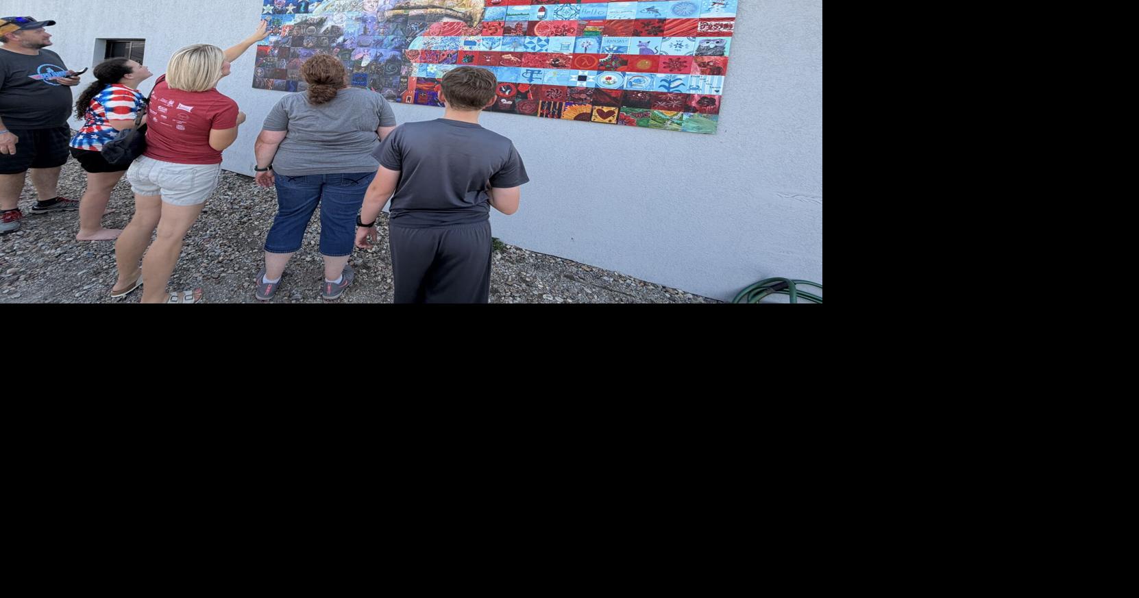 Mural mosaic includes patriotic features, Kansas motifs — and black squirrel with UFO