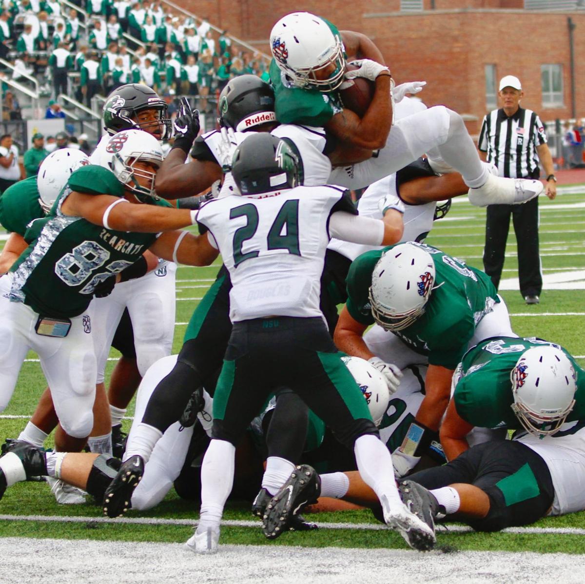 Bearcats Use Lethal Air Strike Attack To Drown Riverhawks Sports