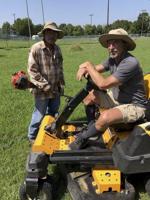 Volunteers help prepare Mike Deak track for Parkinson's Run