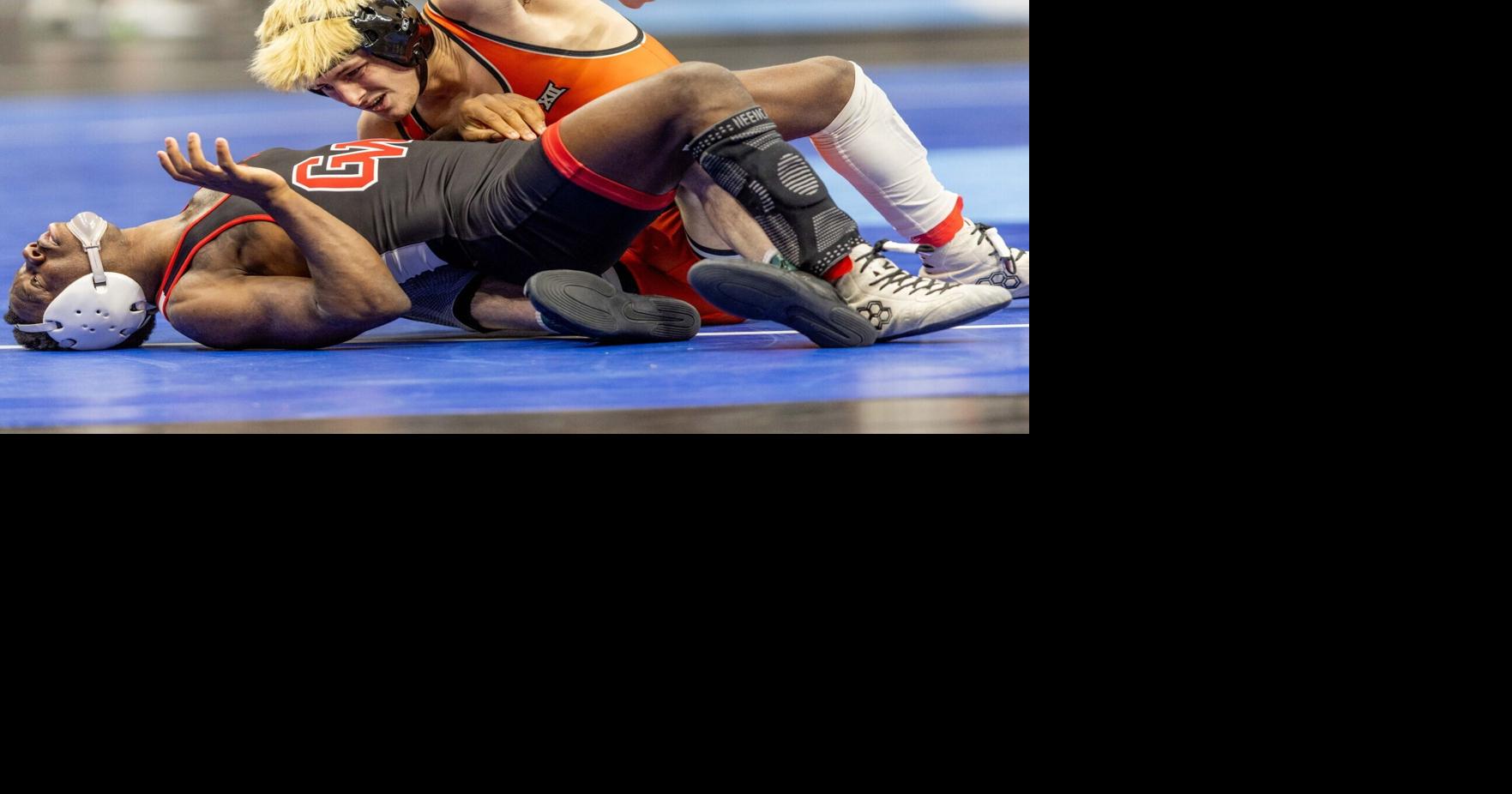 NCAA Championships Day 1 recap: Oklahoma State sends 7 to quarterfinals; in 4th place