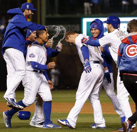 Banner moment: Chicago Cubs finally raise championship flag
