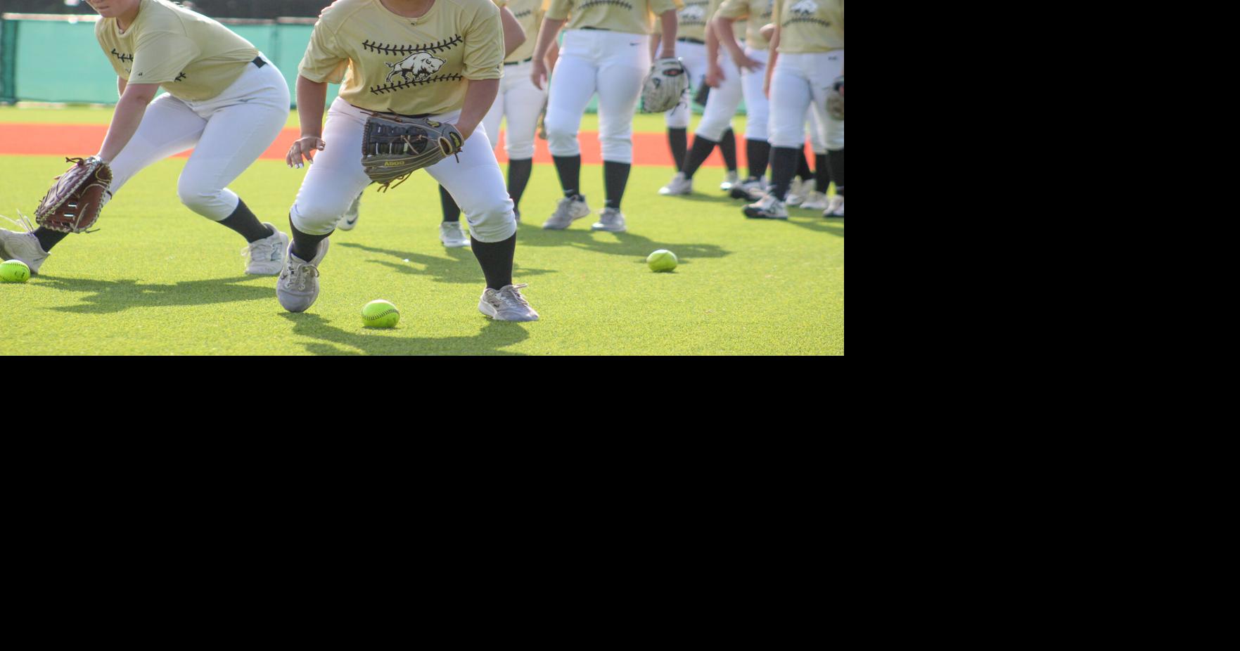 Teamwork common theme at softball, volleyball practices