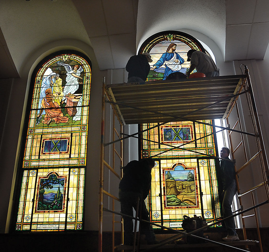 Stained glass windows removed from church News