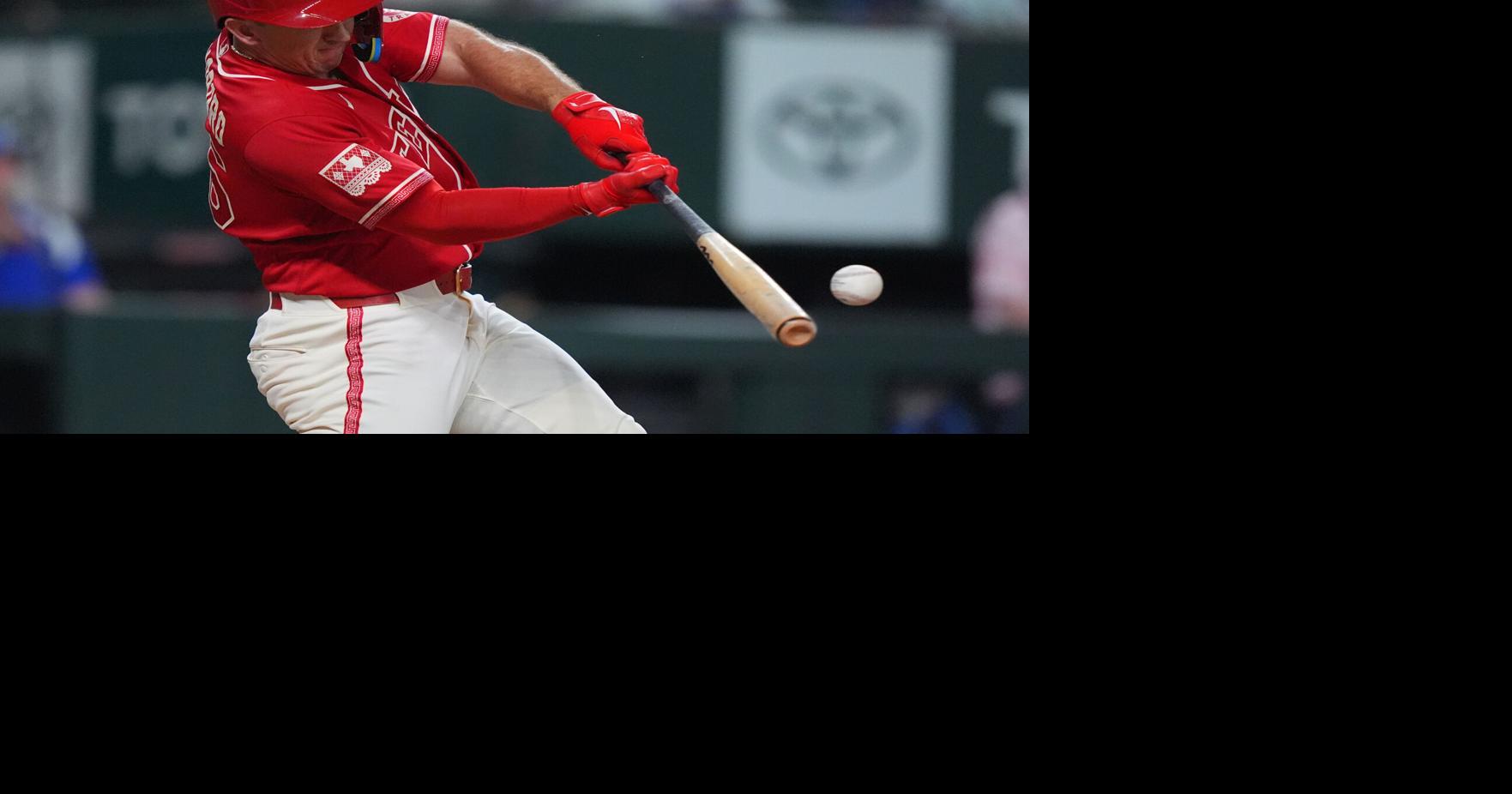 Langford and Burger homer in a four-run eighth as the Rangers beat the Astros 7-3