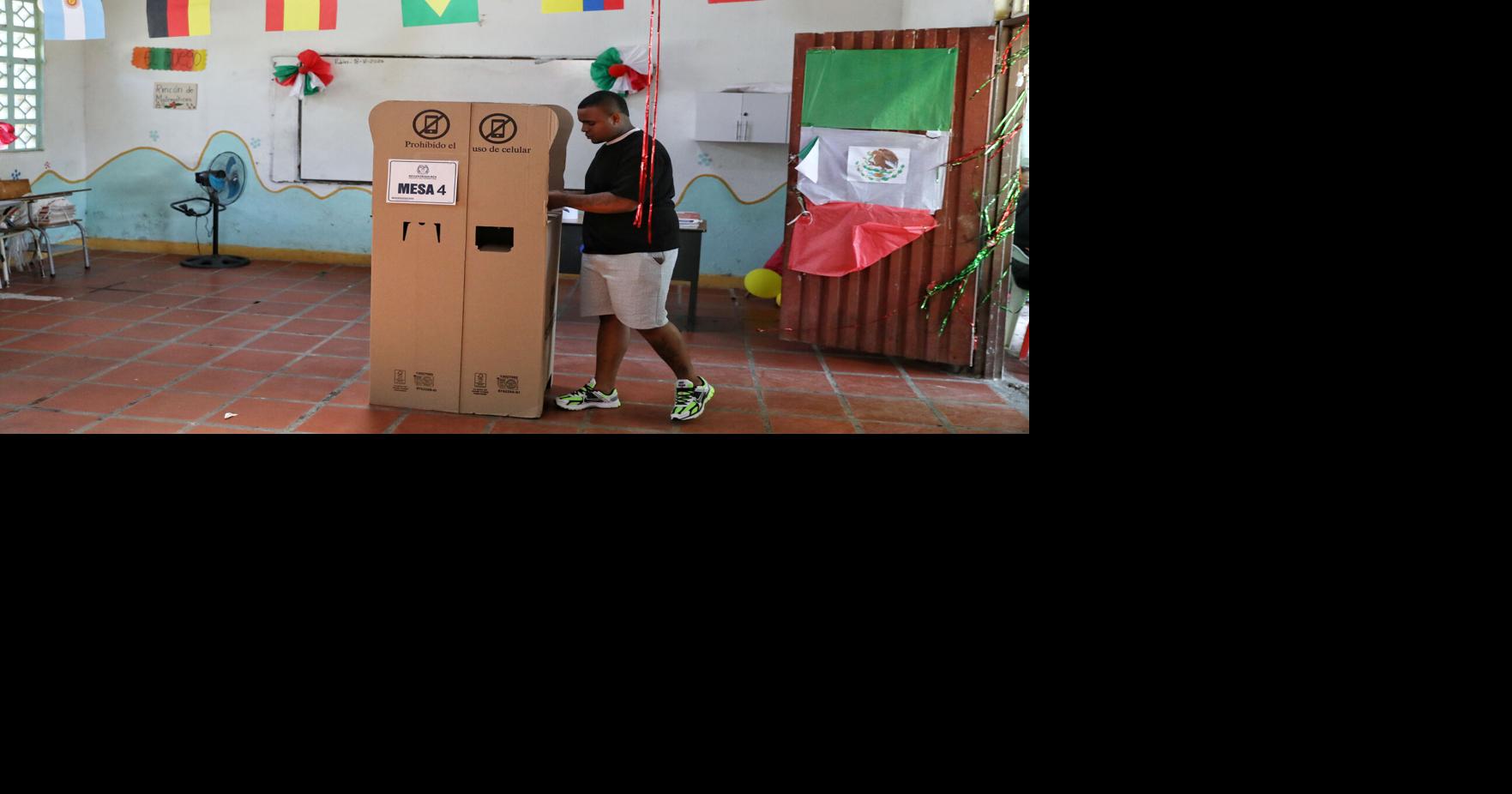 Colombians choose between an outsider and a progressive in a presidential runoff election, in photos