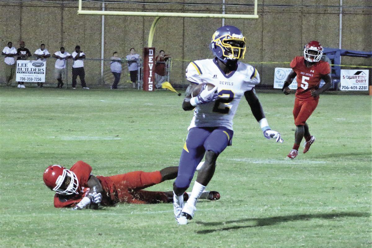 Screaming Devils Make History Defeat Lincoln County 28 21